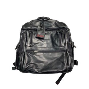 Tumi Black leather Backpack with Adjustable Straps and Durable Design